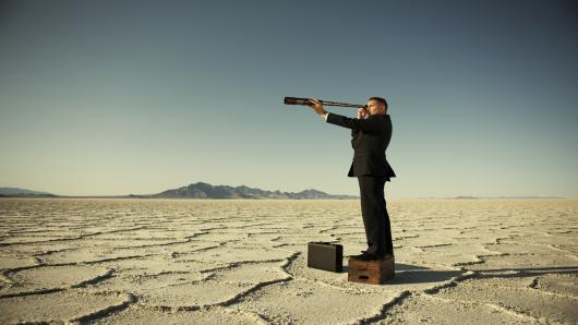 100538971-man-looking-through-telescope-desert-gettyp.530x298